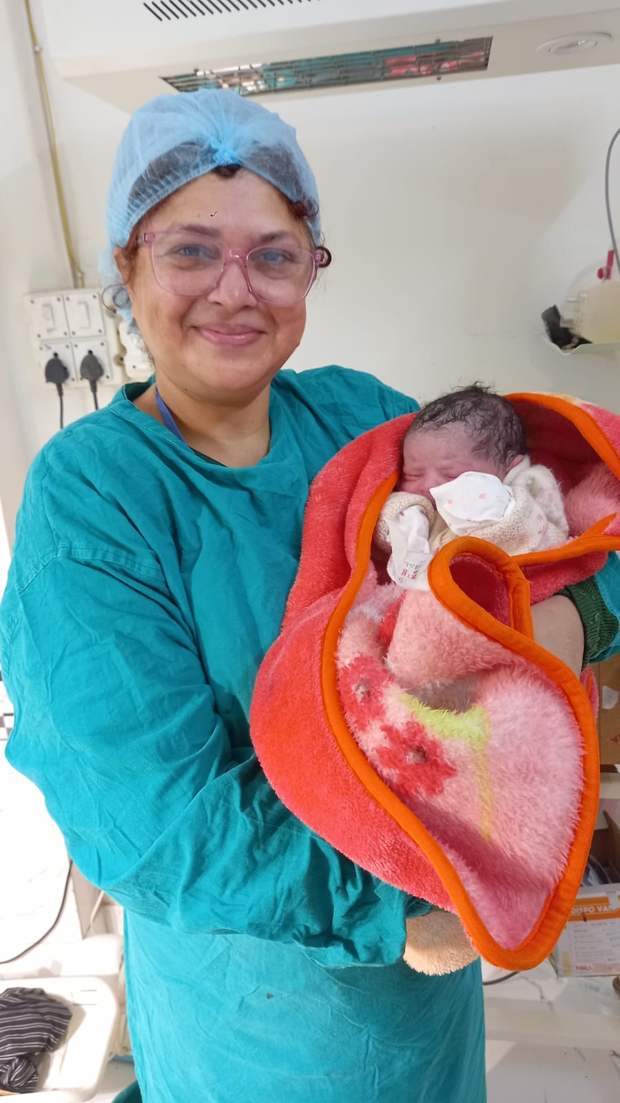 Doctor presenting newborn baby to family after surrogacy